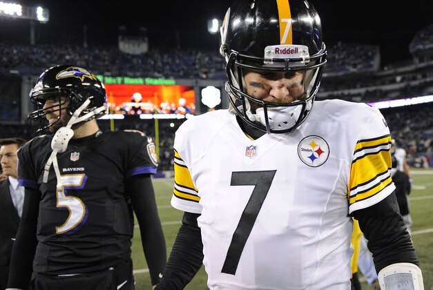 Pittsburgh Steelers quarterback Ben Roethlisberger (7) walks off the field after shaking hands with Baltimore Ravens quarterback Joe Flacco after an NFL football game Thursday, Nov. 28, 2013, in Baltimore. Baltimore won 22-20. (AP Photo/Nick Wass)
