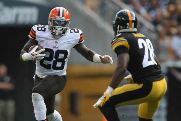 Sep 7, 2014; Pittsburgh, PA, USA; Cleveland Browns running back Terrance West (28) runs the ball against Pittsburgh Steelers cornerback Cortez Allen (28) during the second half at Heinz Field. Pittsburgh won the game, 30-27. Mandatory Credit: Jason Bridge-USA TODAY Sports