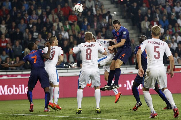 Stefan De Vrij, top, of Netherlands scores with a header during the Euro 2016 qualifying match between Czech Republic and Netherlands in Prague, Czech Republic, Tuesday, Sept. 9, 2014. (AP Photo/Petr David Josek) Stefan De Vrij, top, of Netherlands scores with a header during the Euro 2016 qualifying match between Czech Republic and Netherlands in Prague, Czech Republic, Tuesday, Sept. 9, 2014. (AP Photo/Petr David Josek)