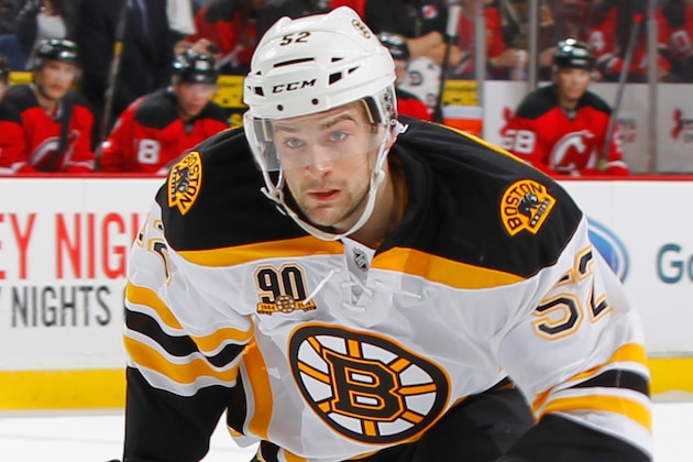 NEWARK, NJ - APRIL 13: Matt Lindblad #52 of the Boston Bruins skates against the New Jersey Devils during the game at the Prudential Center on April 13, 2014 in Newark, New Jersey. (Photo by Andy Marlin/NHLI via Getty Images)