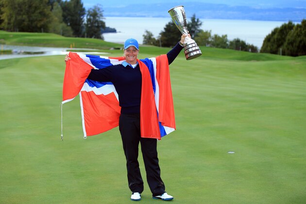EVIAN-LES-BAINS, FRANCE - SEPTEMBER 15:  Suzann Pettersen of Norway holds the trophy after securing victory in the third round of The Evian Championship at the Evian Resort Golf Club on September 15, 2013 in Evian-les-Bains, France.  (Photo by Richard Heathcote/Getty Images)
