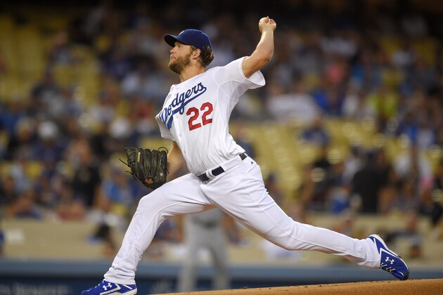 Los Angeles Dodgers starting pitcher Clayton Kershaw throws to the plate during the first inning of a baseball game against the San Diego Padres, Monday, Sept. 8, 2014, in Los Angeles. (AP Photo/Mark J. Terrill)