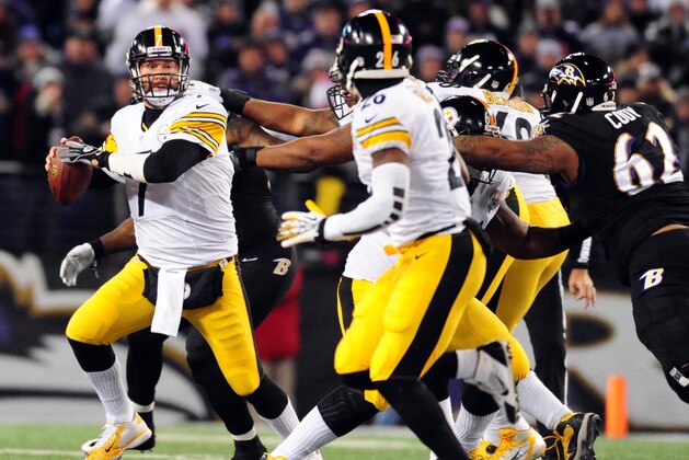 Nov 28, 2013; Baltimore, MD, USA; Pittsburgh Steelers quarterback Ben Roethlisberger (7) prepares to throw the ball against the Baltimore Ravens during a NFL football game on Thanksgiving at M&T Bank Stadium. Mandatory Credit: Evan Habeeb-USA TODAY Sports