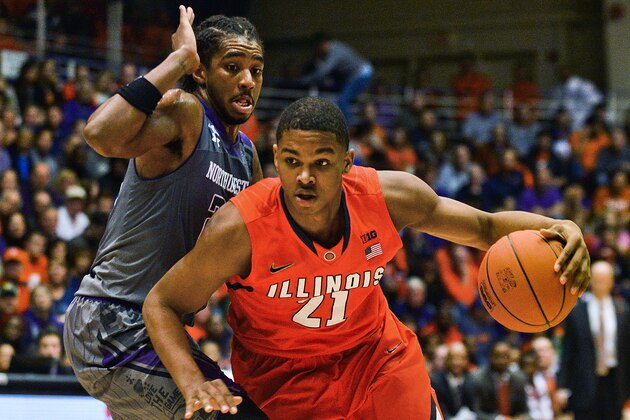 Illinois' Malcolm Hill (21) dribbles against Northwestern's JerShon Cobb (23) during the first half of an NCAA college basketball game in Evanston, Ill., on Sunday, Jan. 12, 2014. (AP Photo/Matt Marton)