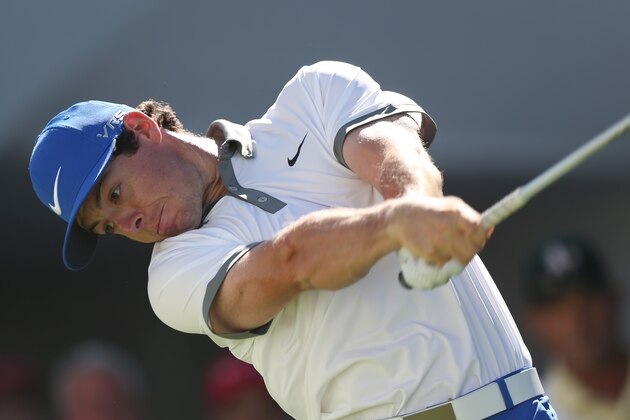 Rory McIlroy, of Northern Ireland, tees off on the first hole in the final round of the BMW Championship golf tournament in Cherry Hills Village, Colo., Sunday, Sept. 7, 2014. (AP Photo/David Zalubowski)