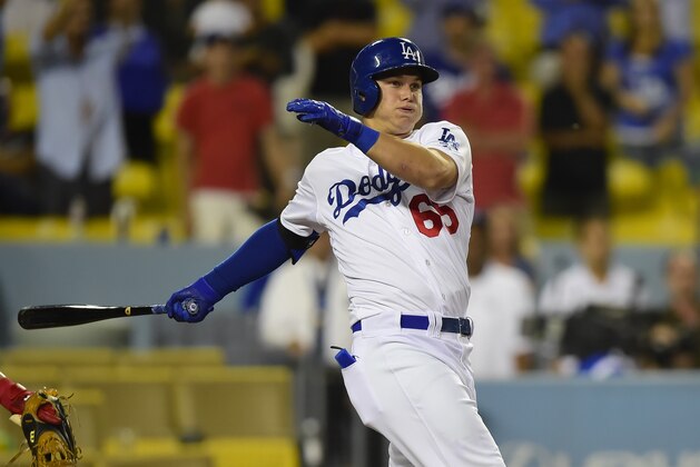 Los Angeles Dodgers Joc Pederson takes a swing in the ninth inning of a baseball game against the Washington Nationals, Monday, Sept. 1, 2014, in Los Angeles. The Nationals won 6-4. (AP Photo/Gus Ruelas)