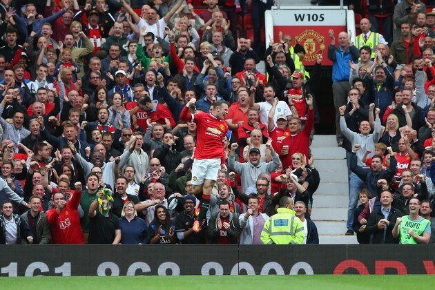 MANCHESTER, ENGLAND - AUGUST 16:  Wayne Rooney of Manchester United celebrates scoring his team's first goal during the Barclays Premier League match between Manchester United and Swansea City at Old Trafford on August 16, 2014 in Manchester, England.  (Photo by Alex Livesey/Getty Images)