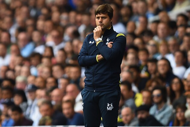 LONDON, ENGLAND - AUGUST 31:  Brendan Rodgers, manager of Liverpool and Mauricio Pochettino the Spurs manager on the touchline during the Barclays Premier League match between Tottenham Hotspur and Liverpool at White Hart Lane on August 31, 2014 in London, England.  (Photo by Jamie McDonald/Getty Images)