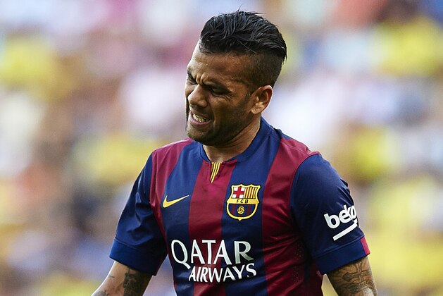 VILLARREAL, SPAIN - AUGUST 31:  Dani Alves of Barcelona gestures during the La Liga match between Villarreal CF and FC Barcelona at El Madrigal stadium on August 31, 2014 in Villarreal, Spain.  (Photo by Manuel Queimadelos Alonso/Getty Images)