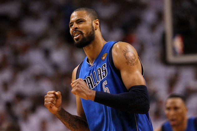 MIAMI, FL - JUNE 12:  Tyson Chandler #6 of the Dallas Mavericks reacts against the Miami Heat in the third quarter of Game Six of the 2011 NBA Finals at American Airlines Arena on June 12, 2011 in Miami, Florida. NOTE TO USER: User expressly acknowledges and agrees that, by downloading and/or using this Photograph, user is consenting to the terms and conditions of the Getty Images License Agreement.  (Photo by Ronald Martinez/Getty Images)