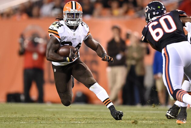 CLEVELAND, OH - AUGUST 28:  Isaiah Crowell #34 of the Cleveland Browns carries the ball in front of Taylor Boggs #60 of the Chicago Bears during the fourth quarter at FirstEnergy Stadium on August 28, 2014 in Cleveland, Ohio.  (Photo by Joe Sargent/Getty Images)