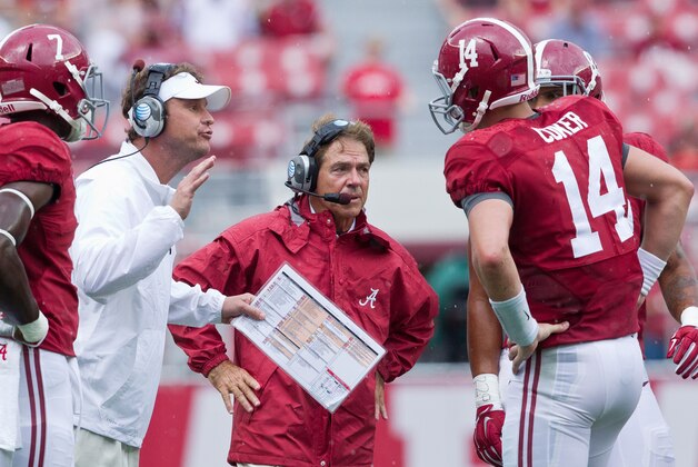 Sep 6, 2014; Tuscaloosa, AL, USA; Alabama Crimson Tide offensive coordinator Lane Kiffen and head coach Nick Saban all to quarterback Jake Coker (14)at Bryant-Denny Stadium. Mandatory Credit: Marvin Gentry-USA TODAY Sports