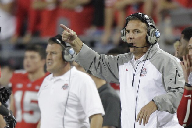 Ohio State head coach Urban Meyer on the sidelines against Virginia Tech during an NCAA college football game Saturday, Sept. 6, 2014, in Columbus, Ohio. (AP Photo/Jay LaPrete)