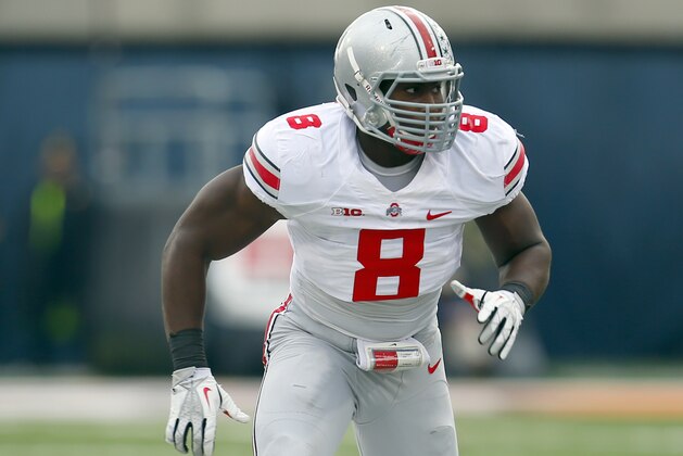 Ohio State defensive lineman Noah Spence (8) lines up against Illinois during the first half of an NCAA college football game on Saturday, Nov. 16, 2013, in Champaign, Ill. (AP Photo/Jeff Haynes)