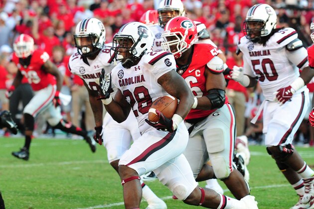 ATHENS, GA - SEPTEMBER 7: Mike Davis #28 of the South Carolina Gamecocks carries the ball against the Georgia Bulldogs at Sanford Stadium on September 7, 2013 in Athens, Georgia. (Photo by Scott Cunningham/Getty Images)