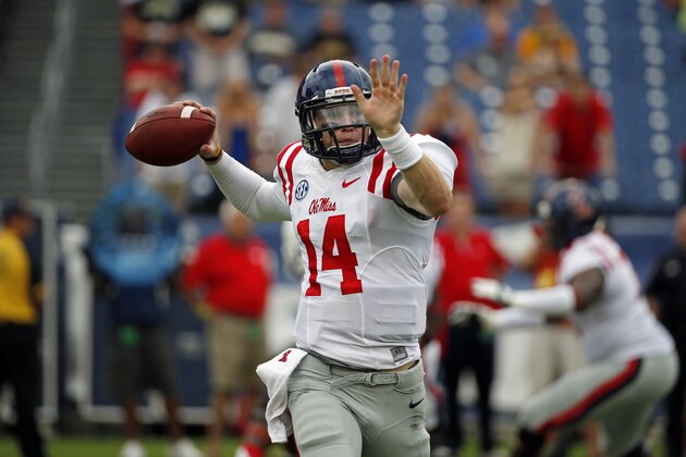 Mississippi quarterback Bo Wallace passes against Vanderbilt in the first quarter of an NCAA college football game Saturday, Sept. 6, 2014, in Nashville, Tenn. (AP Photo/Mark Humphrey)