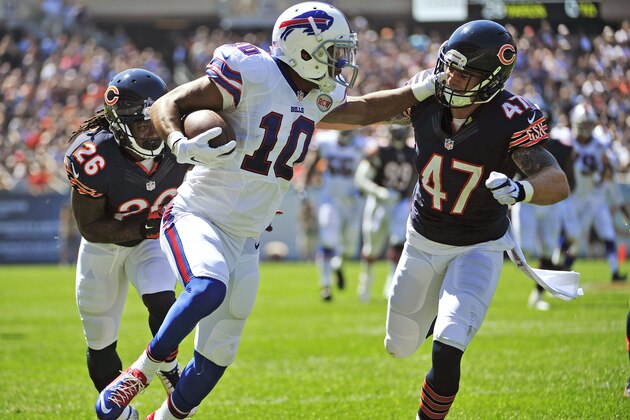 CHICAGO, IL - SEPTEMBER 07: Chris Conte #47 of the Chicago Bears tackles Robert Woods #10 of the Buffalo Bills after a reception during the first quarter of their game on September 7, 2014 at Soldier Field in Chicago, Illinois.  (Photo by David Banks/Getty Images)