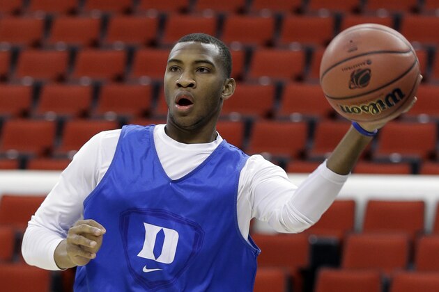 Duke's Rasheed Sulaimon passes the ball during practice at the NCAA college basketball tournament in Raleigh, N.C., Thursday, March 20, 2014. Duke plays Mercer in a second-round game on Friday. (AP Photo/Gerry Broome)