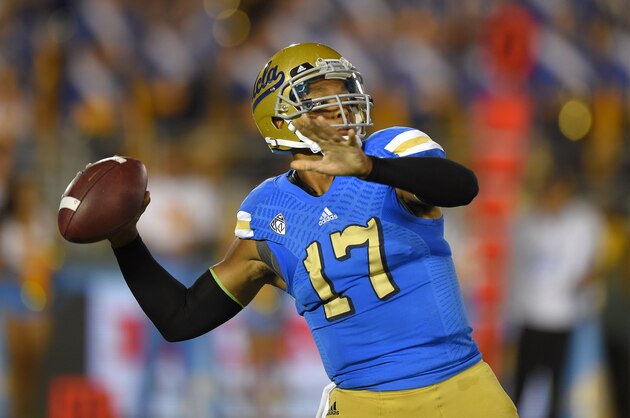 UCLA quarterback Brett Hundley passes the ball during the first half of an NCAA college football game against Memphis, Saturday, Sept. 6, 2014, in Pasadena, Calif. (AP Photo/Mark J. Terrill)