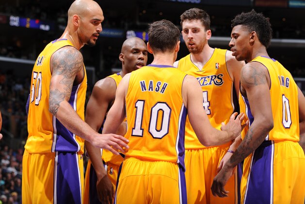 LOS ANGELES, CA - APRIL 4: The Los Angeles Lakers huddle during a game against the Dallas Mavericks at Staples Center on April 4, 2014 in Los Angeles, California. NOTE TO USER: User expressly acknowledges and agrees that, by downloading and/or using this Photograph, user is consenting to the terms and conditions of the Getty Images License Agreement. Mandatory Copyright Notice: Copyright 2014 NBAE (Photo by Andrew D. Bernstein/NBAE via Getty Images)