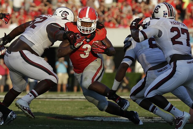 Georgia running back Todd Gurley (3) works against the South Carolina defense during the second half of an NCAA football game, Saturday, Sept. 7, 2013, in Athens, Ga. (AP Photo/John Bazemore)