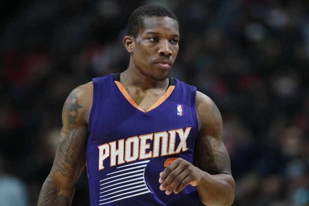 Phoenix Suns guard Eric Bledsoe looks on against the Denver Nuggets in the third quarter of the Suns' 103-99 victory in an NBA basketball game in Denver on Friday, Dec. 20, 2013. (AP Photo/David Zalubowski)