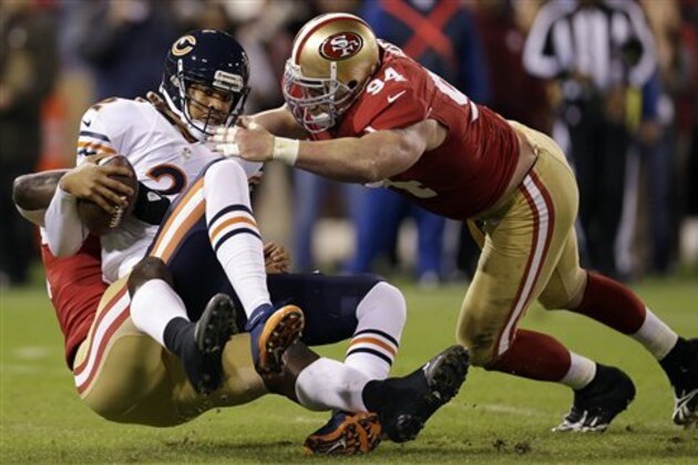 Chicago Bears quarterback Jason Campbell (2) is sacked by San Francisco 49ers linebacker Aldon Smith, left, as defensive tackle Justin Smith (94) converges during the first quarter of an NFL football game in San Francisco, Monday, Nov. 19, 2012. (AP Photo/Marcio Jose Sanchez)