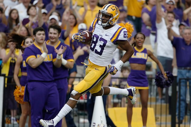 BATON ROUGE, LA - SEPTEMBER 06:  Travin Dural #83 of the LSU Tigers scores a touchdown during the first quarter of a game against the Sam Houston State Bearkats at Tiger Stadium on September 6, 2014 in Baton Rouge, Louisiana.  LSU won the game 56-0. (Photo by Stacy Revere/Getty Images)