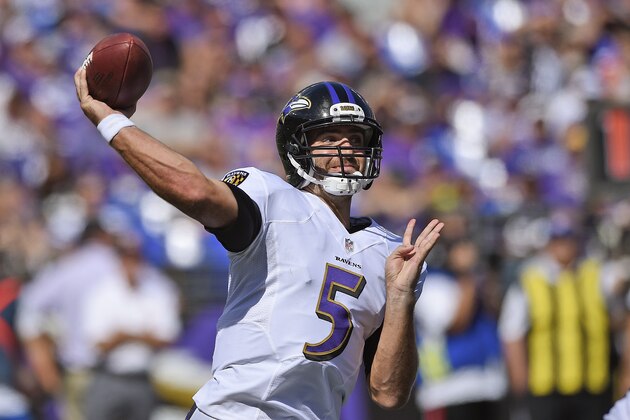 Baltimore Ravens quarterback Joe Flacco (5) passes the ball during the second half of an NFL football game against the Cincinnati Bengals in Baltimore, Md., Sunday, Sept. 7, 2014. (AP Photo/Nick Wass)