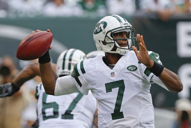 New York Jets quarterback Geno Smith (7) throws a pass during the first half of an NFL football game against the Oakland Raiders Sunday, Sept. 7, 2014, in East Rutherford, N.J. (AP Photo/Seth Wenig)