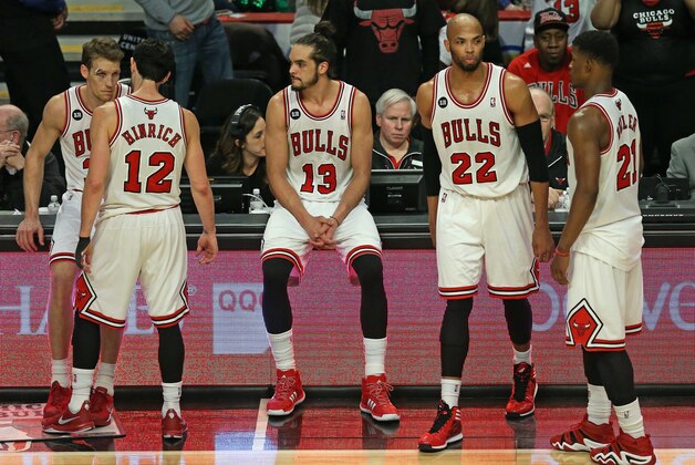 CHICAGO, IL - MARCH 15:  (L-R) Mike Dunleavy #34, Kirk Hinrich #12, Joakim Noah #13, Taj Gibson #22 and Jimmy Butler #21 of the Chicago Bulls wait to reenter a game against the Sacramento Kings after a time out at the United Center on March 15, 2014 in Chicago, Illinois. The Bulls defeated the Kings 94-87. NOTE TO USER: User expressly acknowledges and agrees that, by downloading and or using this photograph, User is consenting to the terms and conditions of the Getty Images License Agreement.  (Photo by Jonathan Daniel/Getty Images)