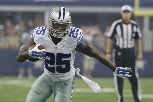 Dallas Cowboys running back Lance Dunbar (25) runs during the first half of an NFL football game against the San Francisco 49ers Sunday, Sept. 7, 2014, in Arlington, Texas. (AP Photo/Tony Gutierrez)