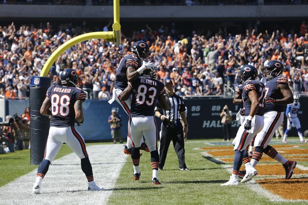 Chicago Bears tight end Martellus Bennett (83) celebrates his touchdown reception with wide receiver Alshon Jeffery (17) during the first half of an NFL football game against the Buffalo Bills Sunday, Sept. 7, 2014, in Chicago. (AP Photo/Charles Rex Arbogast)