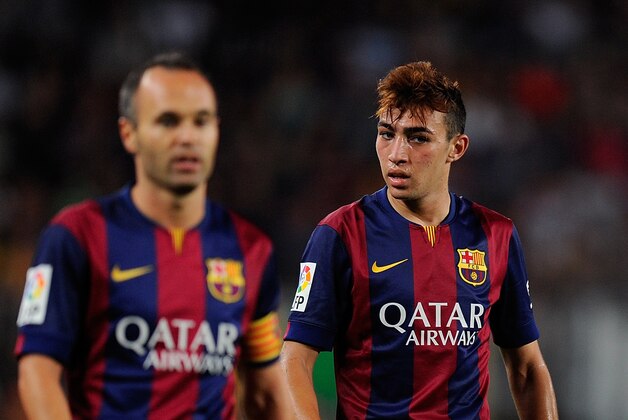 BARCELONA, SPAIN - AUGUST 24:  Munir El Haddadi of FC Barcelona looks on beside Andres Iniesta during the La Liga match between FC Barcelona and Elche FC at Camp Nou stadium on August 24, 2014 in Barcelona, Spain.  (Photo by Denis Doyle/Getty Images)
