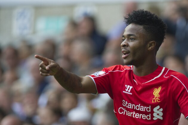 Liverpool's Raheem Sterling celebrates after scoring against Tottenham Hotspur, during their English Premier League soccer match at White Hart Lane, London, Sunday, Aug. 31, 2014 (AP Photo/Bogdan Maran)