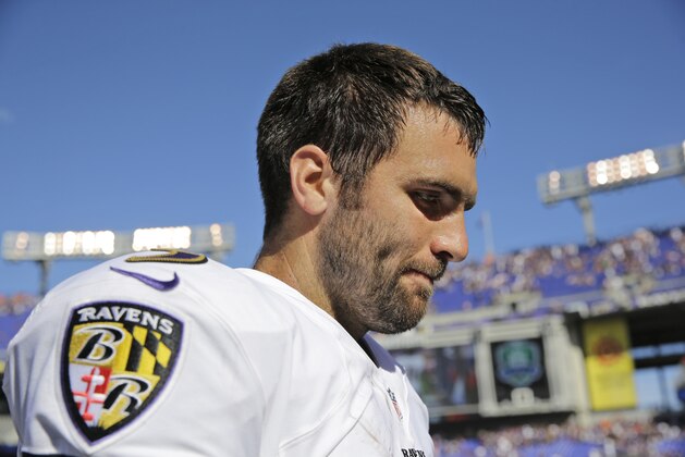 Baltimore Ravens quarterback Joe Flacco (5) walks off the field after an NFL football game against the Cincinnati Bengals in Baltimore, Md., Sunday, Sept. 7, 2014. The Bengals defeated the Ravens 23-16. (AP Photo/Patrick Semansky)