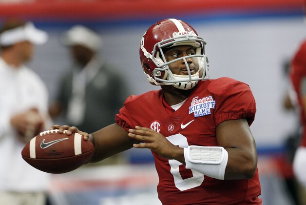 Alabama quarterback Blake Sims (6) warms up before an NCAA college football game against West Virginia Saturday, Aug. 30, 2014, in Atlanta.  (AP Photo/John Bazemore)