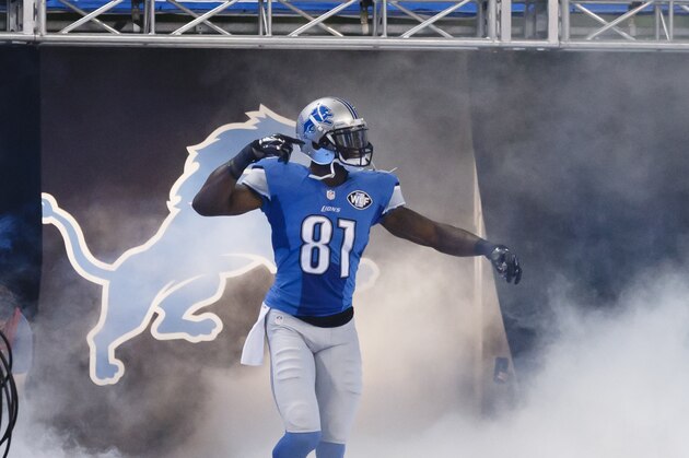 Detroit Lions wide receiver Calvin Johnson (81) during player introductions before an NFL football game against the New York Giants at Ford Field in Detroit, Monday, Sept. 8, 2014. (AP Photo/Rick Osentoski)