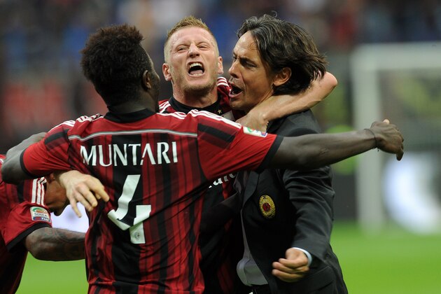 MILAN, ITALY - AUGUST 31:  (L-R) Ignazio Abate,Sulley Ali Muntari and Filippo Inzaghi of AC Milan celebrate the goal of 2-0 during the Serie A match between AC Milan and SS Lazio at Stadio Giuseppe Meazza on August 31, 2014 in Milan, Italy.  (Photo by Pier Marco Tacca/Getty Images for Toyo Tires)