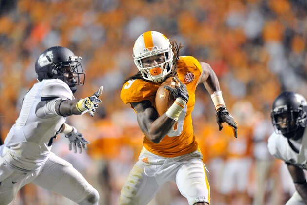 Aug 31, 2014; Knoxville, TN, USA; Tennessee Volunteers wide receiver Von Pearson (9) rushes against the Utah State Aggies during the second half at Neyland Stadium. Tennessee won 38-7. Mandatory Credit: Jim Brown-USA TODAY Sports