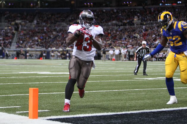 Tampa Bay Buccaneers Bobby Rainey, #43, runs in for a touchdown during the game against the St. Louis Rams at the Edward Jones Dome in St. Louis MO., Sunday, December 22, 2013. (AP Photo/Mike McGinnis)