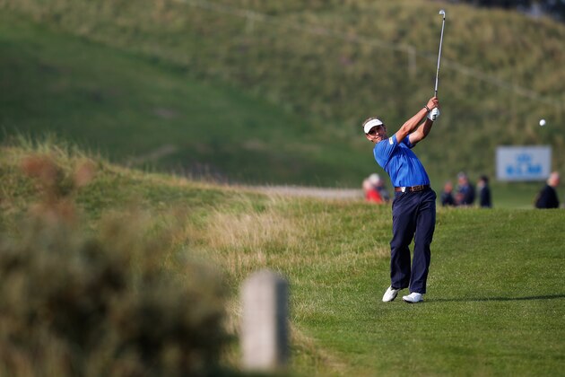 ZANDVOORT, NETHERLANDS - SEPTEMBER 11:  Joost Luiten of the Netherlands hits his second shot on the 16th hole during Day 1 of the KLM Open held at De Kennemer Golf and Country Club on September 11, 2014 in Zandvoort, Netherlands.  (Photo by Dean Mouhtaropoulos/Getty Images)