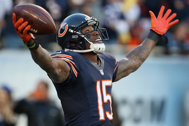 CHICAGO, IL - NOVEMBER 10: Brandon Marshall #15 of the Chicago Bears celebrates a touchdown catch against the Detroit Lions at Soldier Field on November 10, 2013 in Chicago, Illinois. The Lions defeated the Bears 21-19. (Photo by Jonathan Daniel/Getty Images)