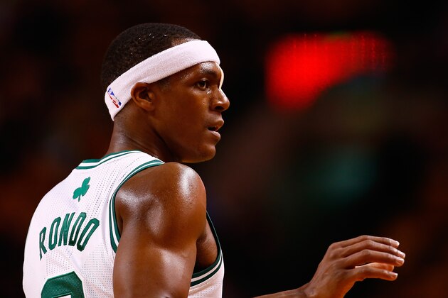 BOSTON, MA - MARCH 26:  Rajon Rondo #9 of the Boston Celtics is seen playing against the Toronto Raptors in the second half after receiving 9 stitches from a cut on his face in the second half during the game at TD Garden on March 26, 2014 in Boston, Massachusetts. NOTE TO USER: User expressly acknowledges and agrees that, by downloading and or using this photograph, User is consenting to the terms and conditions of the Getty Images License Agreement.  (Photo by Jared Wickerham/Getty Images)