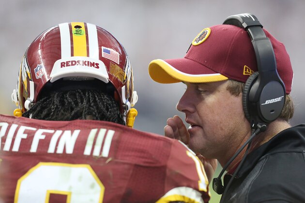 HOUSTON, TX- SEPTEMBER 07: Washington Redskins head coach Jay Gruden gives Washington Redskins quarterback Robert Griffin III #10 the play in the third quarter against the Houston Texans on September 7, 2014 at NRG Stadium in Houston, Texas. (Photo by Thomas B. Shea/Getty Images) HOUSTON, TX- SEPTEMBER 07: Washington Redskins head coach Jay Gruden gives Washington Redskins quarterback Robert Griffin III #10 the play in the third quarter against the Houston Texans on September 7, 2014 at NRG Stadium in Houston, Texas. (Photo by Thomas B. Shea/Getty Images)