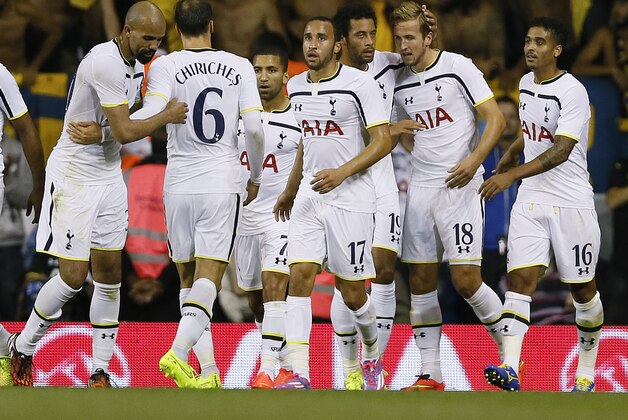 Tottenham's Harry Kane, second right, celebrates with team mates after scoring a goal during the second leg Europa League qualifying soccer match between Tottenham Hotspur and AEL Limassol at White Hart Lane stadium in London Thursday, Aug. 28, 2014. (AP Photo/Kirsty Wigglesworth)