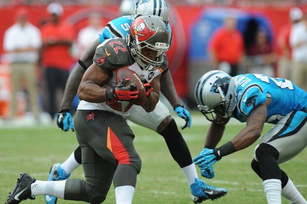 TAMPA, FL - SEPTEMBER 7: Running back Doug Martin #22 of the Tampa Bay Buccaneers runs agains Carolina Panthers at Raymond James Stadium on September 7, 2014 in Tampa, Florida. (Photo by Cliff McBride/Getty Images) )