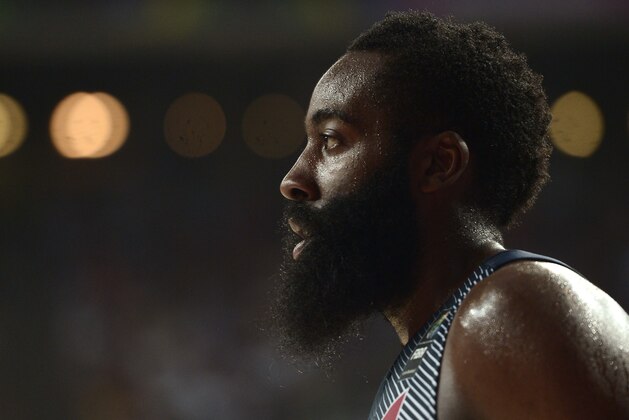United States James Harden walks on the pitch during the Basketball World Cup semifinal match against Lithuania at the Palau Sant Jordi in Barcelona, Spain, Thursday, Sept. 11, 2014. The 2014 Basketball World Cup competition will take place in various cities in Spain from Aug. 30 through Sept. 14. (AP Photo/Manu Fernandez)