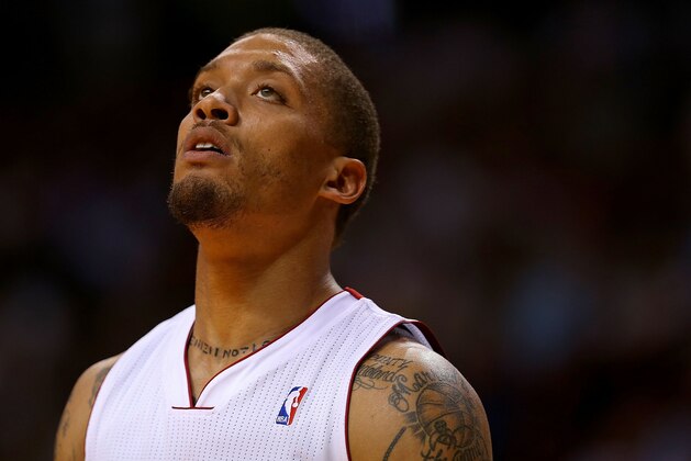MIAMI, FL - NOVEMBER 12: Michael Beasley #8 of the Miami Heat looks on during a game against the Milwaukee Bucks at AmericanAirlines Arena on November 12, 2013 in Miami, Florida. NOTE TO USER: User expressly acknowledges and agrees that, by downloading and/or using this photograph, user is consenting to the terms and conditions of the Getty Images License Agreement. Mandatory copyright notice:  (Photo by Mike Ehrmann/Getty Images)