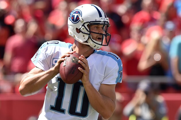 KANSAS CITY, MO - SEPTEMBER 07:   Jake Locker #10 of the Tennessee Titans drops back to pass against the Kansas City Chiefs at Arrowhead Stadium on September 7, 2014 in Kansas City, Missouri.  (Photo by Peter Aiken/Getty Images)